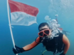 Dispar Kaltim Kibarkan Merah Putih di Bawah Laut Miang